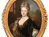 portrait of a lady in a green dress with a gold frame