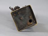 an antique bronze figurine of a horse and rider on a square base