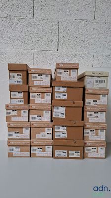 several boxes stacked on top of each other on a table