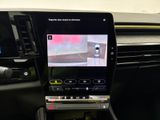 the interior of a car with a display of a car ' s camera