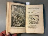 an open book with a picture of a man on a horse and a woman on a horse in the background