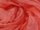 a close up shot of a pink scarf with a very long fringe