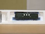 a toy train sitting in a box on a table