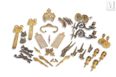 a lot of gold and silver items on a white surface