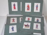 several cards of different types of uniforms are displayed on a table