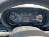 a close up of a car dashboard with a speedometer and gauges