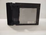 the back panel of a laptop with a hard drive attached to it