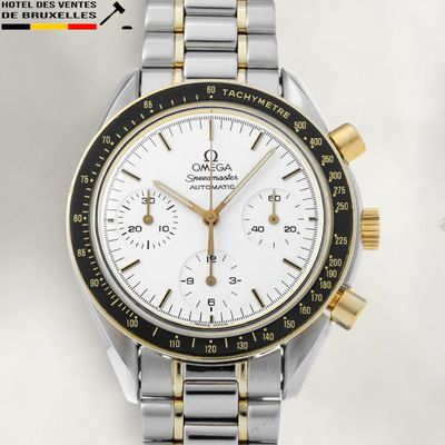 an image of a close up of a watch on a white surface