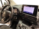 a picture of a car dashboard with a tablet on it