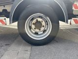 a truck that is parked on the side of the road