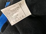 a label on the back of a stuffed animal
