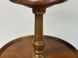 an image of a wooden table with a clock on top of it