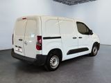 a picture of a white van parked in a room