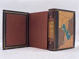 a book that is open to show a picture of a woman