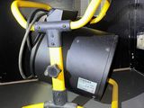 a yellow light that is sitting on top of a table