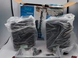 two speakers and a box of wires on a table
