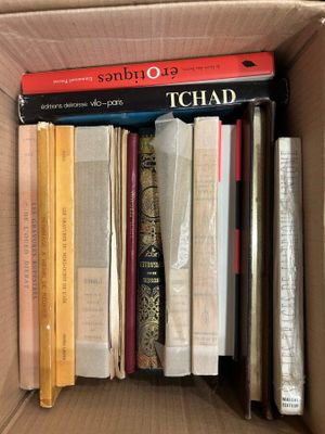 a box full of books that are sitting on a table