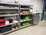many shelves with various items on them in a garage