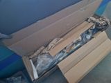a cardboard box that has a bunch of items inside of it