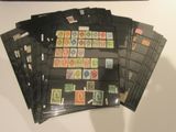 a lot of stamps that are on the table