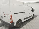 a picture of a white van parked in a garage