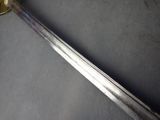 a sword that is sitting on a table