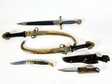 five different types of knives on a white surface