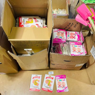 several boxes of food are sitting on the floor in a room