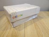a box that is sitting on a wooden table