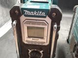 two makita machines sitting next to each other on a table