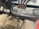 a close up of a car ' s dashboard with a control panel