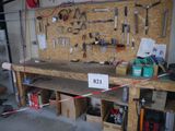 a workbench with tools on it in a garage