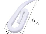 a close up of a white plastic door handle with measurements
