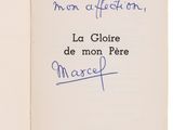 an open book with a handwritten title on it