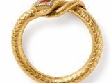 a gold snake ring with a red stone in the middle