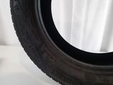 an image of a tire on a table with a white background