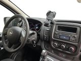 dashboard view of a car with a steering wheel and dashboard controls