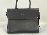 a black leather handbag on a white background