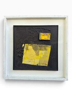 yellow and black abstract painting in a white frame on a white wall