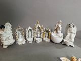 many figurines that are sitting on a table