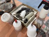 a box of tools on a table next to a bottle of water