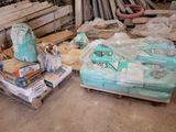 a lot of boxes and pallets that are sitting on the floor