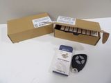 a box of batteries and a remote control on a table