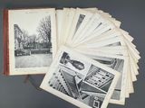 an open book with a bunch of old photographs on top of it