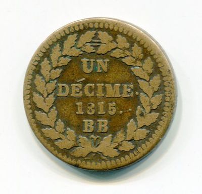 a close up of a coin on a white surface