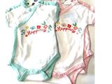 two baby ones that are laying next to each other