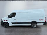 the white van is parked in a garage with a red stripe on the side of the van