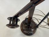 a lamp that is sitting on a table next to a pair of scissors