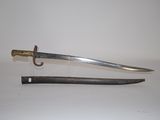 a knife that is laying on a table