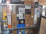 a large metal cage with a bunch of items in it
